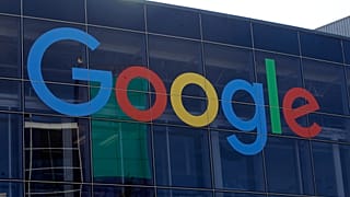 A sign is shown on a Google building at their campus in Mountain View, Calif., Tuesday, Sept. 24, 2019. (AP Photo/Jeff Chiu)