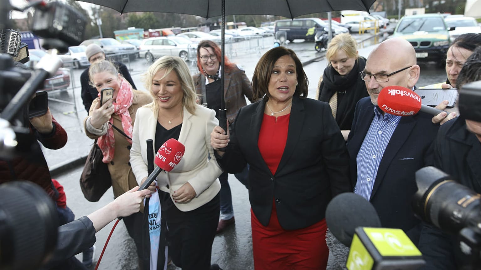 Sinn Fein leader Mary Lou McDonald, right, and deputy leader Michelle O'Neill arrive at the RDS count centre in Dublin, Ireland, Sunday, Feb. 9, 2020. 