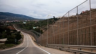 A security fence separates Morocco and the Spanish enclave of Melilla, Spain.