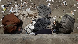 پلیس افغانستان: ۹ بی‌خانمان معتاد به ضرب گلوله افراد ناشناس کشته شدند