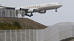 AIRPORT SECURITY; People enjoy viewing of Airplanes at the park of Narita Airport, in Narita, Saturday, March 14, 2015. (AP Photo/Koji Sasahara)