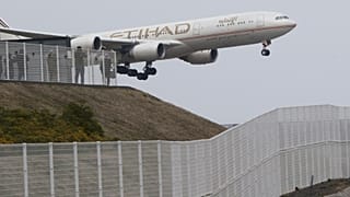 AIRPORT SECURITY; People enjoy viewing of Airplanes at the park of Narita Airport, in Narita, Saturday, March 14, 2015. (AP Photo/Koji Sasahara)