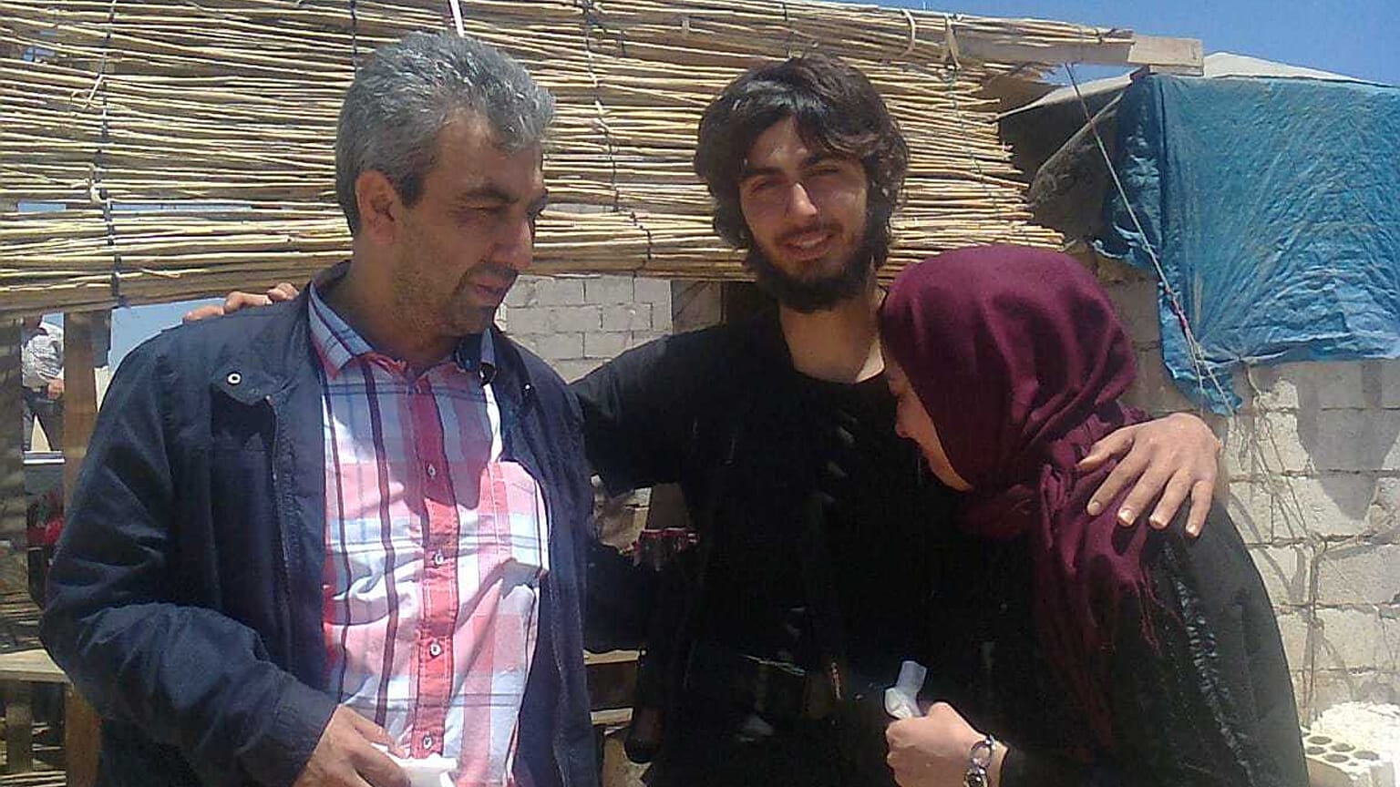 Osman et Gülay T. avec leur fils  Burak