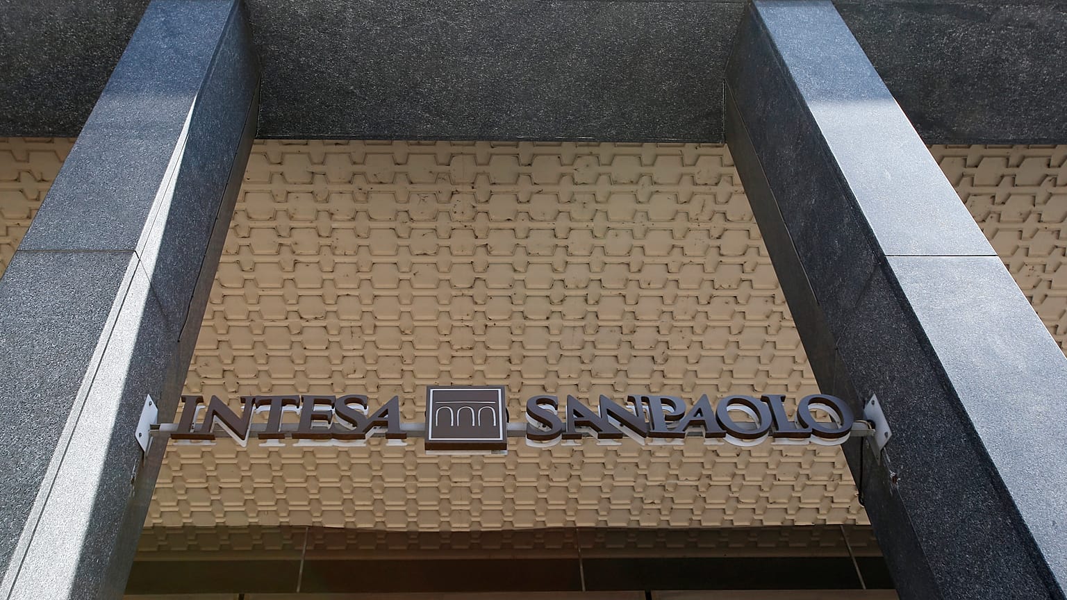 View of a Intesa Sanpaolo bank branch in Milan. (AP Photo/Antonio Calanni)