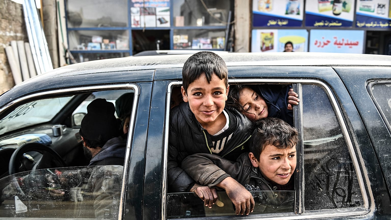 Civilians flee from Idlib toward the north to find safety inside Syria near the border with Turkey, Saturday, Feb. 15, 2020. (AP Photo) 