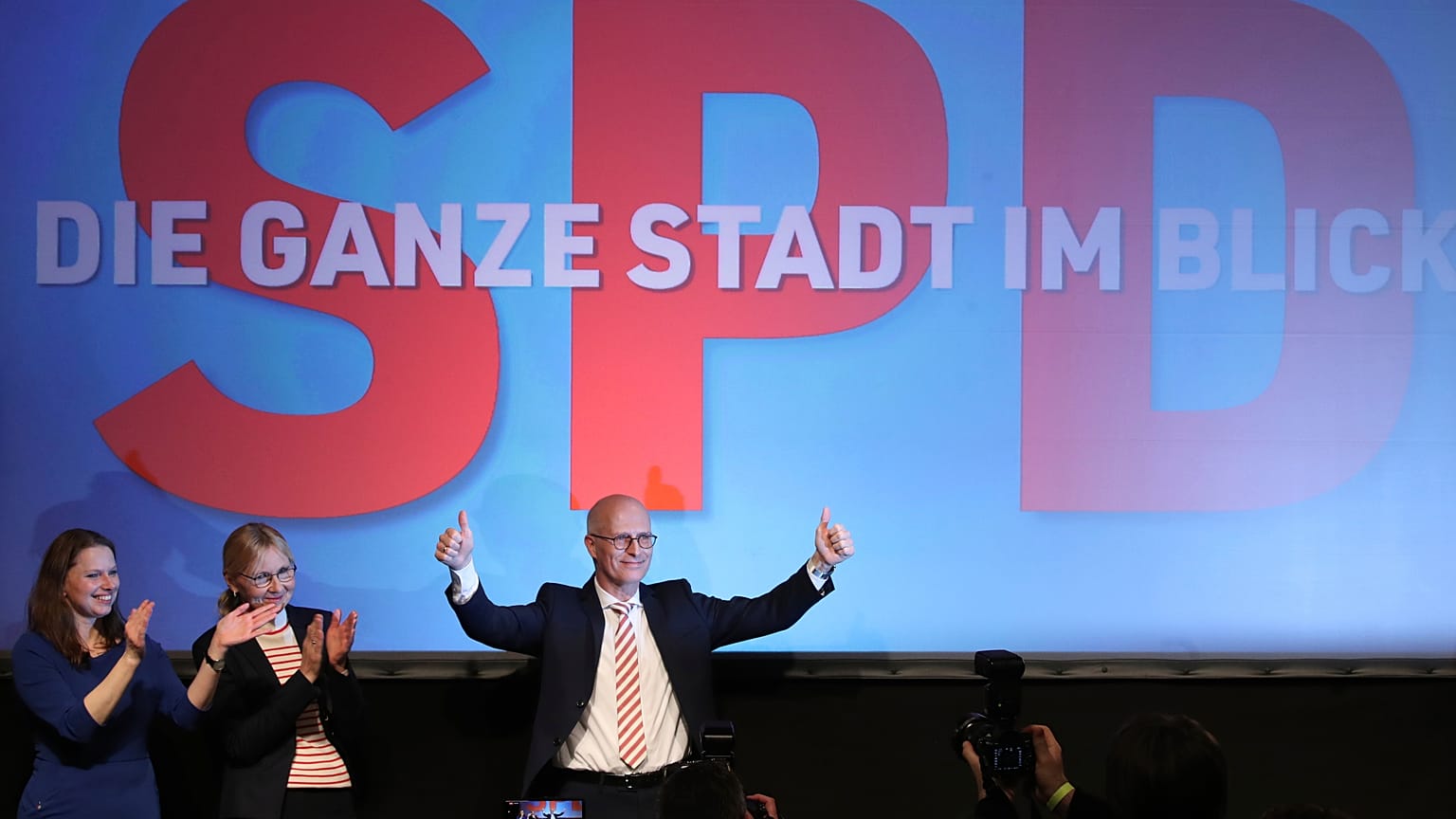 SPD top candidate and First Mayor of Hamburg Peter Tschentscher celebrates with supporters after exit polls for the Hamburg state elections announced on Feb. 23, 2020.