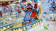 Performers from the Portela samba school parade during Carnival celebrations at the Sambadrome in Rio de Janeiro, Brazil.