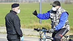 A carabiniere at a checkpoint near Castiglione d'Adda.
