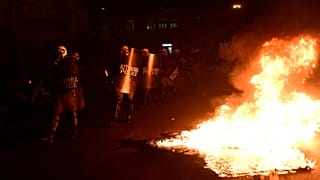 Protesters clashed with police over the building of new migrant camps on the island of Lesbos