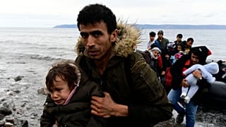 Refugees arrived in Lesbos aboard dinghies on Friday morning 