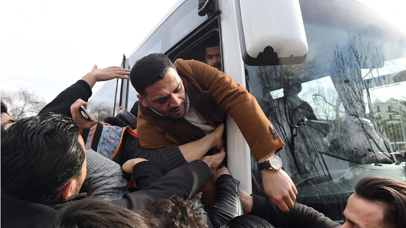 Dozens of refugees boarded buses - not linked to Bolu - bound for the Turkish border with Greece on Friday