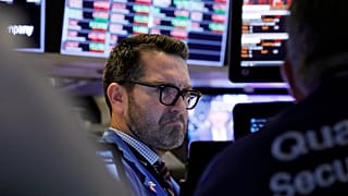 Trader Leon Montana works on the floor of the New York Stock Exchange, Friday, Feb. 28, 2020.