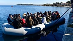 Local residents prevent migrants from reaching the small port of Thermi, on the Greek island of Lesbos.