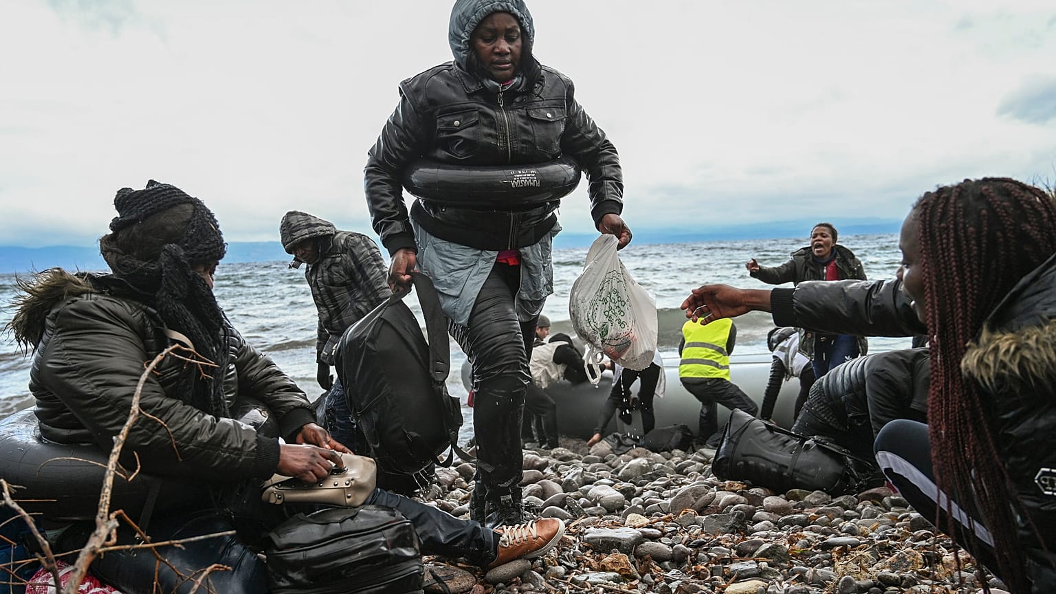 Migrants arrive in Lesbos after Erdogan opens Turkey's border with EU