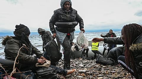 Migrants arrive in Lesbos after Erdogan opens Turkey's border with EU