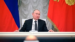 Russian President Vladimir Putin attends a meeting with members of a working group created to discuss constitutional amendments in the Kremlin in Moscow.