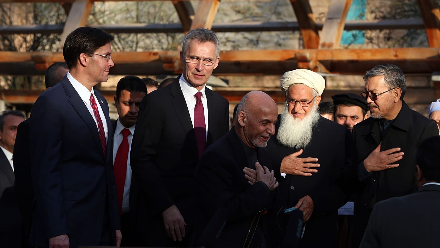 Afghan President Ashraf Ghani, center, arrives with NATO Secretary General Jens Stoltenberg, and U.S. Secretary of Defense Mark Esper for a joint news conference, Feb 29, 2020