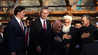 Afghan President Ashraf Ghani, center, arrives with NATO Secretary General Jens Stoltenberg, and U.S. Secretary of Defense Mark Esper for a joint news conference, Feb 29, 2020