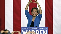 Massachusetts Senator Elizabeth Warren makes the shape of a heart