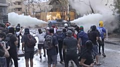 Чили: акция протеста обернулась столкновениями демонстрантов с полиицией 