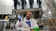 An Israeli scientist works at a laboratory at the MIGAL Research Institute in Kiryat Shmona in the upper Galilee in northern Israel on March 1, 2020 
