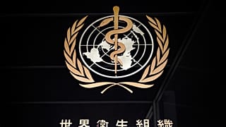 A picture taken on March 9, 2020 shows the sign of the World Health Organization