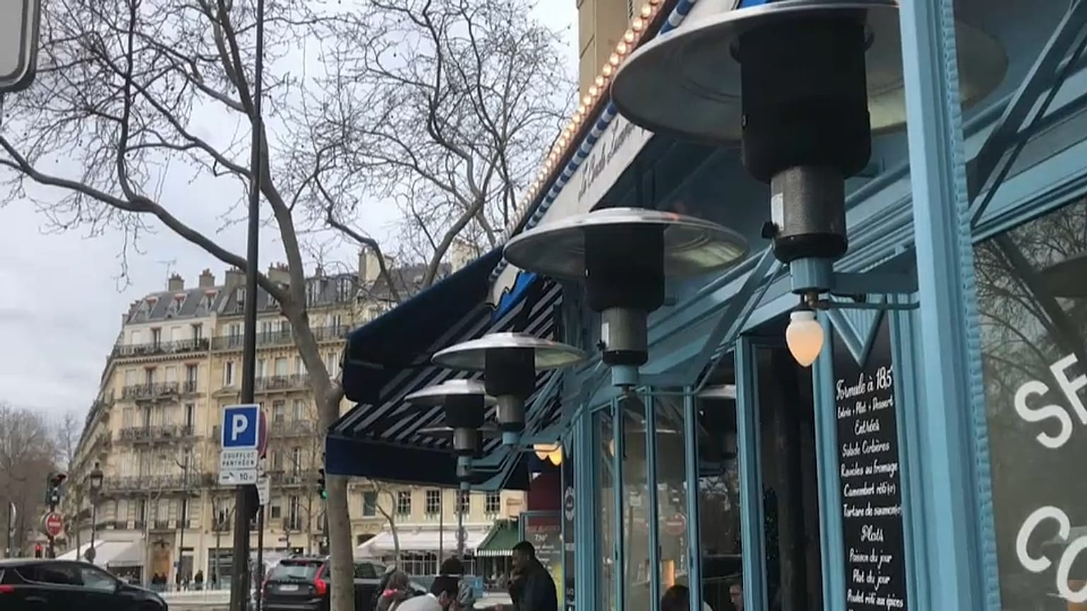 Gas heaters keep a terrace warm near Paris' Luxembourg gardens. 
