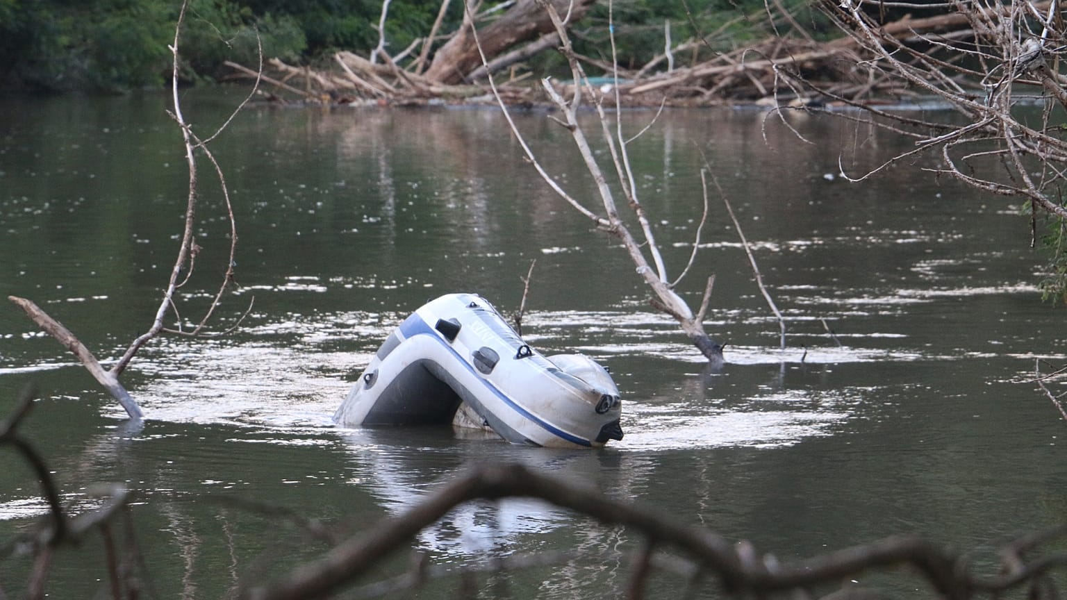 A boat sunk in the river that separates Turkey from Greece. 