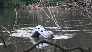 A boat sunk in the river that separates Turkey from Greece. 