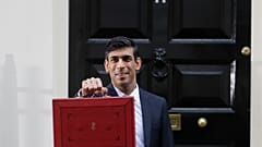 Britain's Chancellor of the Exchequer Rishi Sunak outside No 11 Downing Street with the traditional red box containing the budget speech, March 11, 2020.