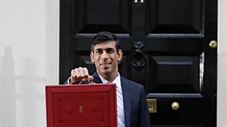 Britain's Chancellor of the Exchequer Rishi Sunak outside No 11 Downing Street with the traditional red box containing the budget speech, March 11, 2020.