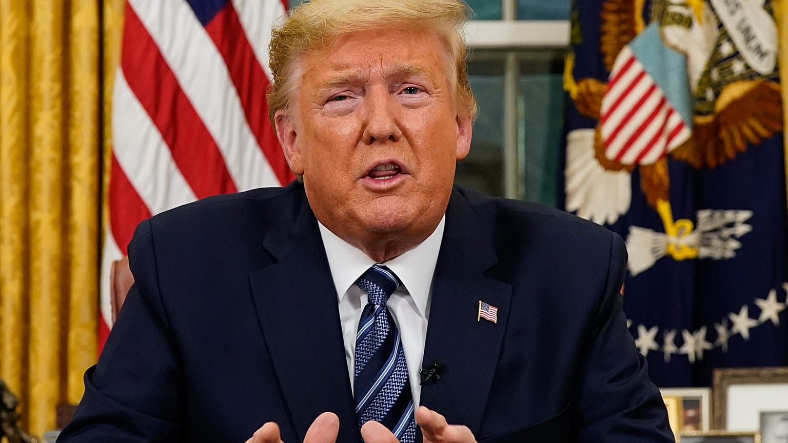 Donald Trump s’adresse aux Américains depuis le Bureau ovale de la Maison-Blanche, à Washington, le 11 mars 2020 à Washington. 