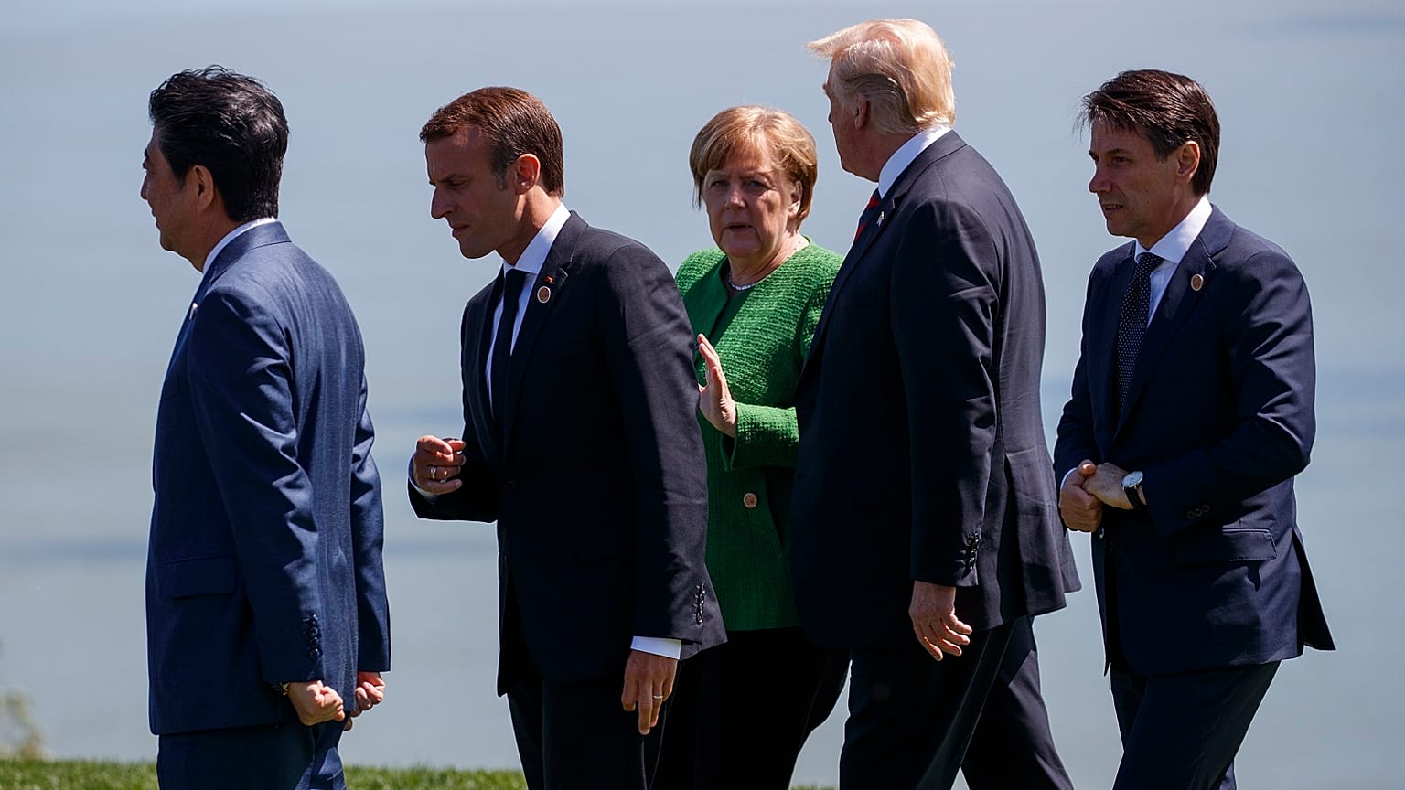 From left, Japanese Prime Minister Shinzo Abe, French President Emmanuel Macron, Merkel, Trump, and Italian Prime Minister Giuseppe Conte