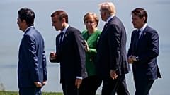 From left, Japanese Prime Minister Shinzo Abe, French President Emmanuel Macron, Merkel, Trump, and Italian Prime Minister Giuseppe Conte