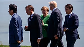From left, Japanese Prime Minister Shinzo Abe, French President Emmanuel Macron, Merkel, Trump, and Italian Prime Minister Giuseppe Conte
