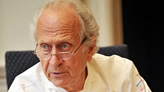 French chef Michel Roux speaks to other judges during the finals of the 'Roux Scholarship' competition at the Mandarin Oriental hotel in central London, on April 6, 2009. 