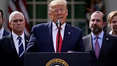 Donald Trump speaks outside the White House on Friday night. 