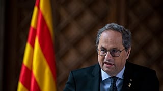 Catalan regional president Quim Torra speaks at the Palace of the Generalitat, the headquarter of the Government of Catalonia, in Barcelona, Spain.