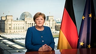 German Chancellor Angela Merkel poses for a photo during the recording of her first direct TV address to the nation in over 14 years in power, at the chancellery in Berlin.