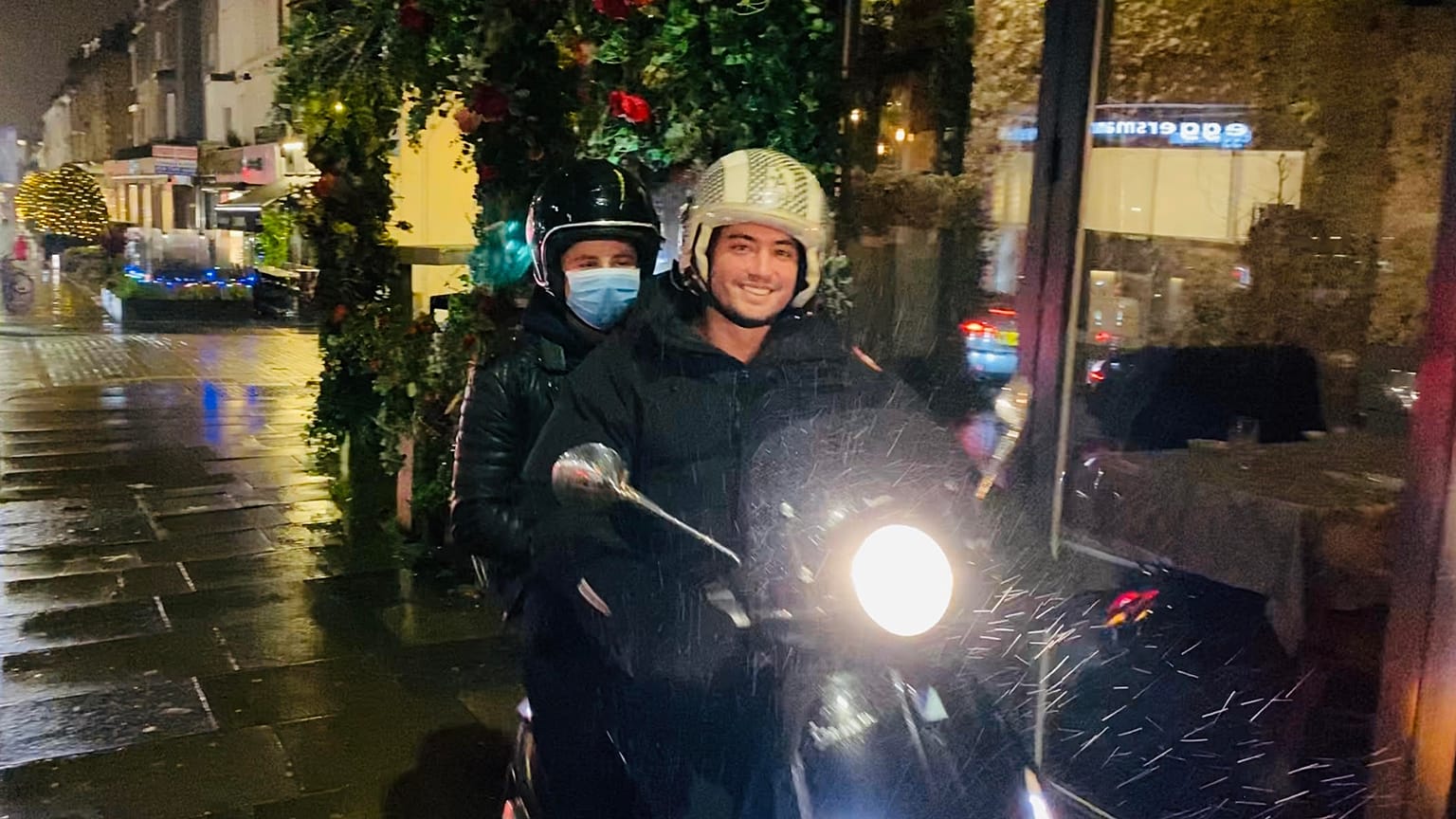 Business owner Chase Hunter delivers pizzas across London for those who donate to charity