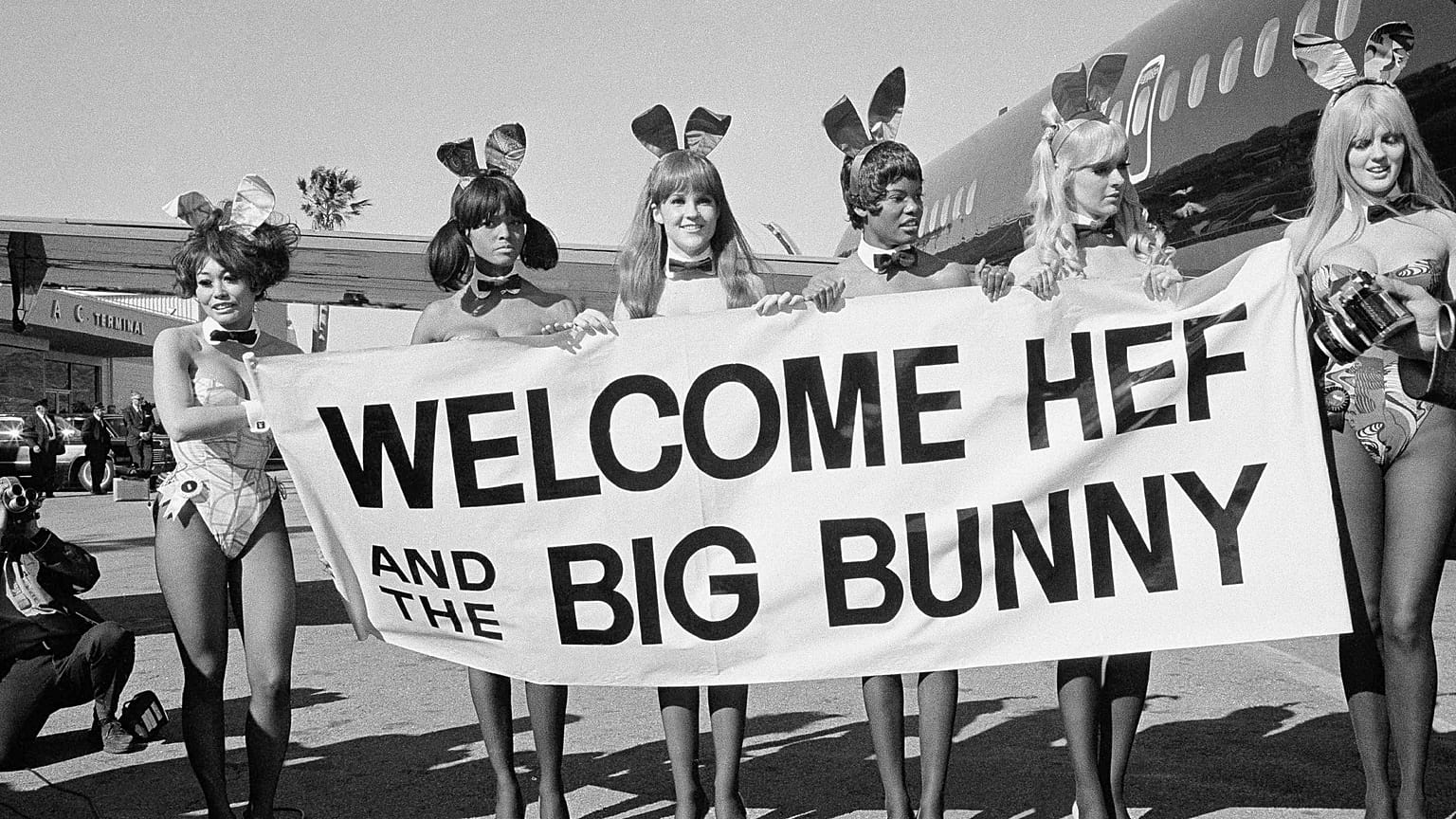 Playboy Bunnies welcome Hugh Hefner on the inaugural flight of his new DC-9 jetliner, The Big Bunny, March 17, 1970. The women are unidentified. (AP Photo/George Brich)
