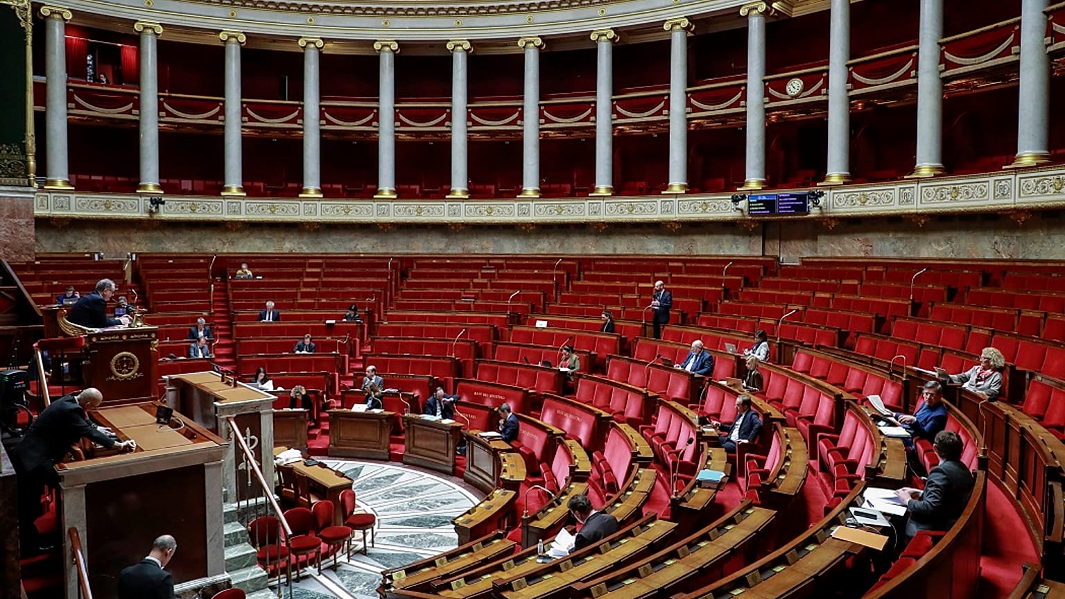 French members of Parliament take part in a debate about the state of health emergency bill at the National Assembly on March 21, 2020, in Paris