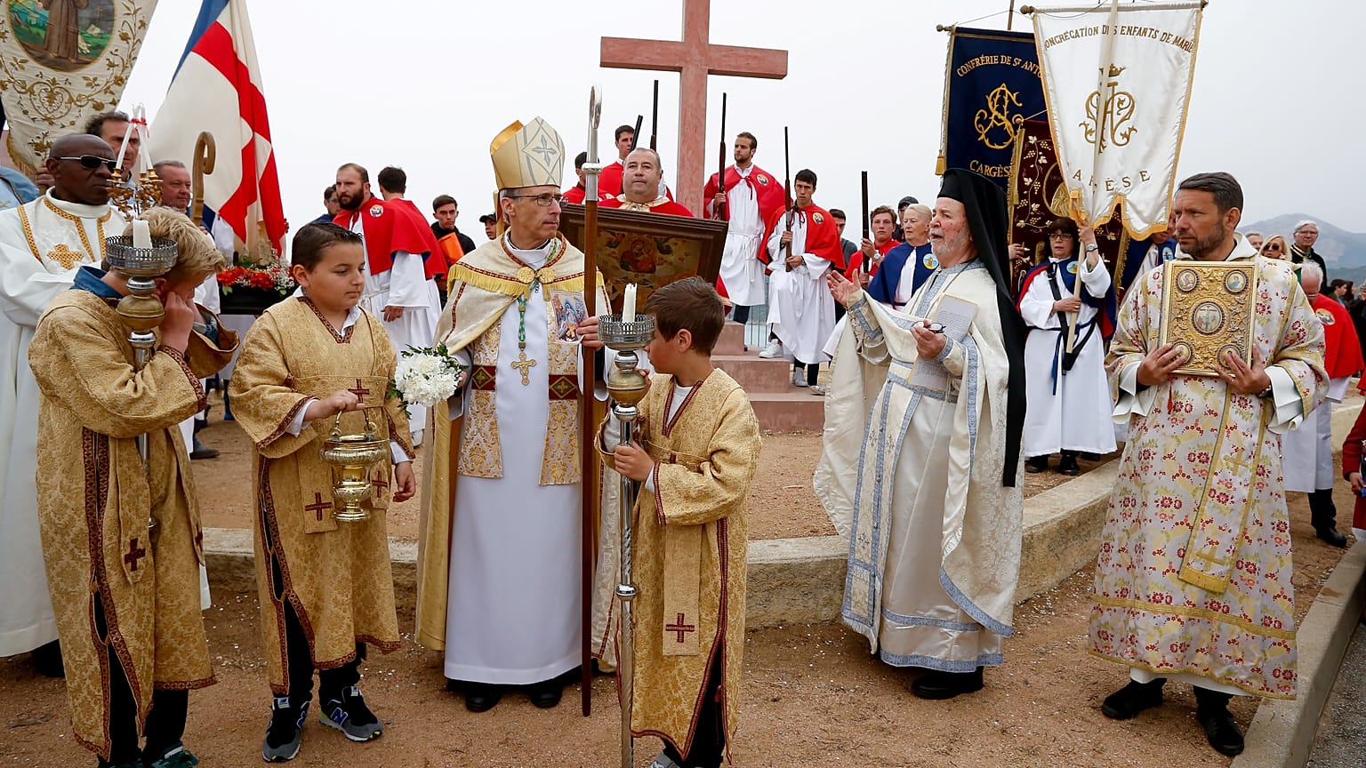 Orthodox priest of the Saint Spyridion church in Cargese attend a religious ceremony, on April 22, 2019