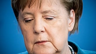 German Chancellor Angela Merkel  on the spread of the new coronavirus COVID-19 at the Chancellery, in Berlin on March 22, 2020. (Photo by Michael Kappeler / AFP)