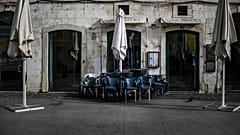 Closed restaurants are pictured in downtown Lisbon