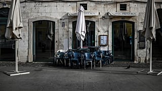 Closed restaurants are pictured in downtown Lisbon
