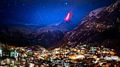 The Matterhorn mountain is illuminated by light artist Gerry Hofstetter aiming to send messages of hope and support to the ones suffering from COVID-19. Zermatt, Switzerland