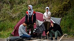 Virus Outbreak Greece Migrants