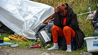 Virus Outbreak Greece Migrants