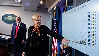 Dr. Deborah Birx, White House coronavirus response coordinator, gestures to a chart as President Donald Trump listens as they speak about the coronavirus